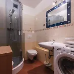 By The Apartament